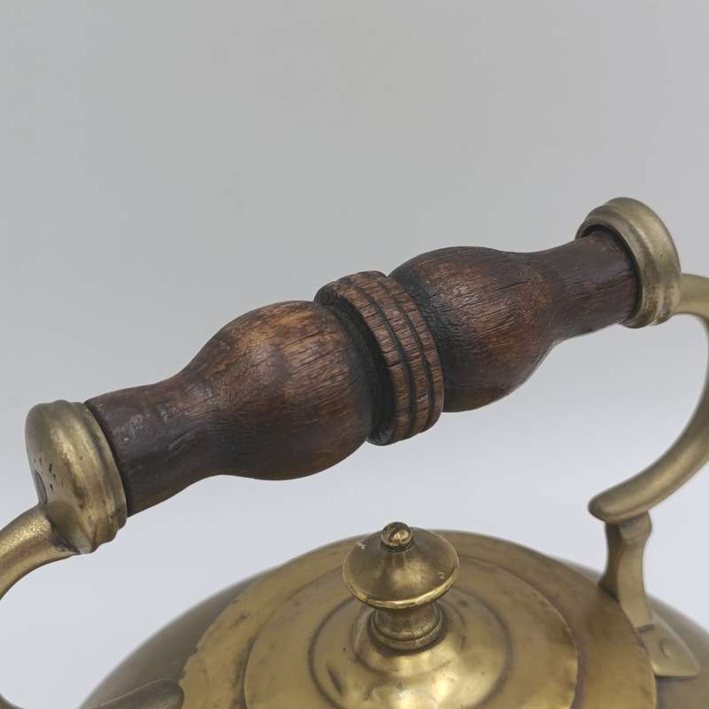Beautiful vintage brass kettle with wooden handle