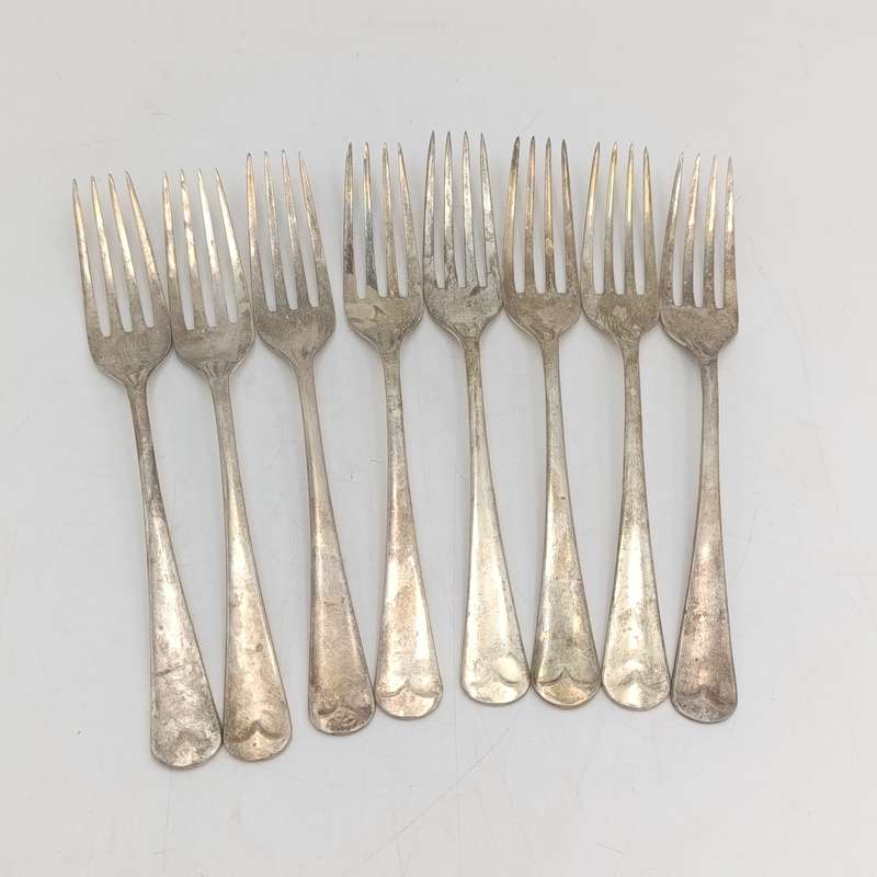 Vintage set of 8 Pak-Alam silverplated forks