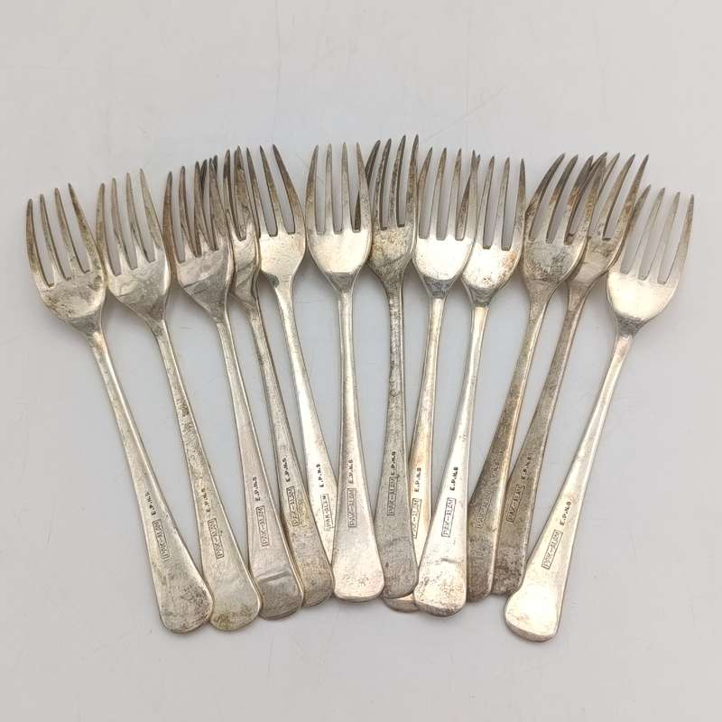 Vintage set of 12 Pak-Alam silverplated forks