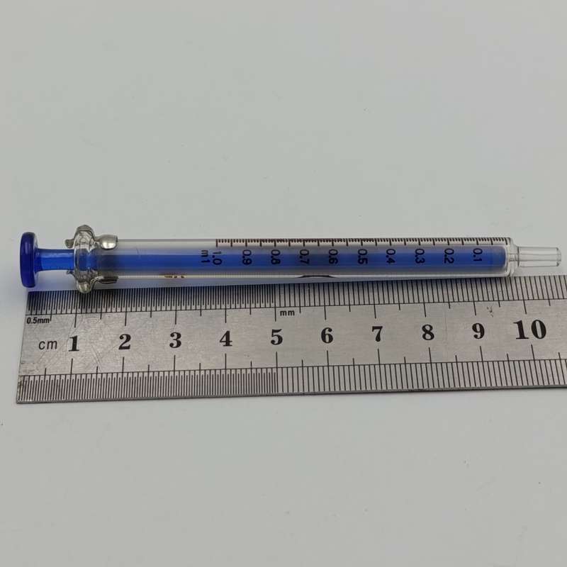 Lot of 7 vintage glass syringes