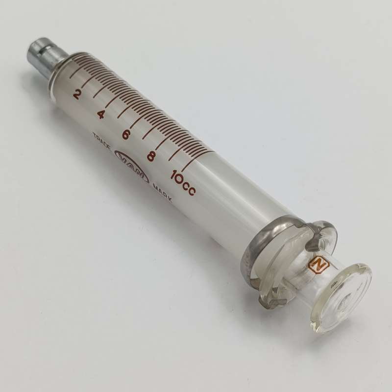 Lot of 7 vintage glass syringes