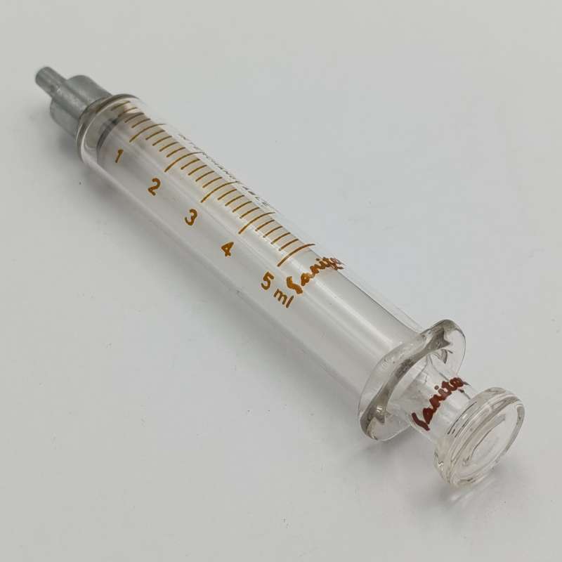 Lot of 7 vintage glass syringes