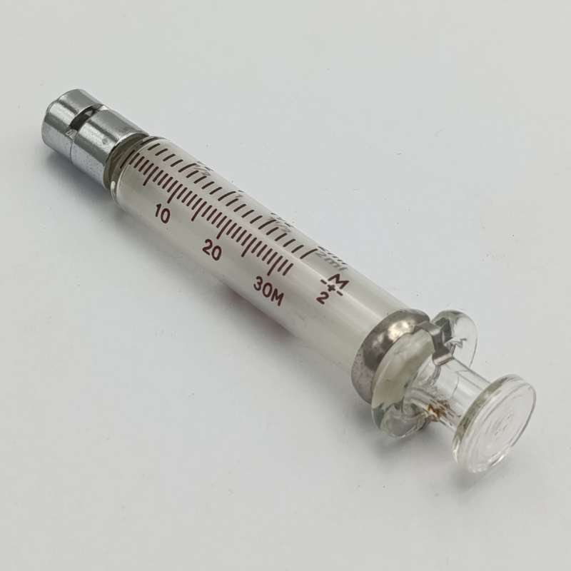 Lot of 7 vintage glass syringes