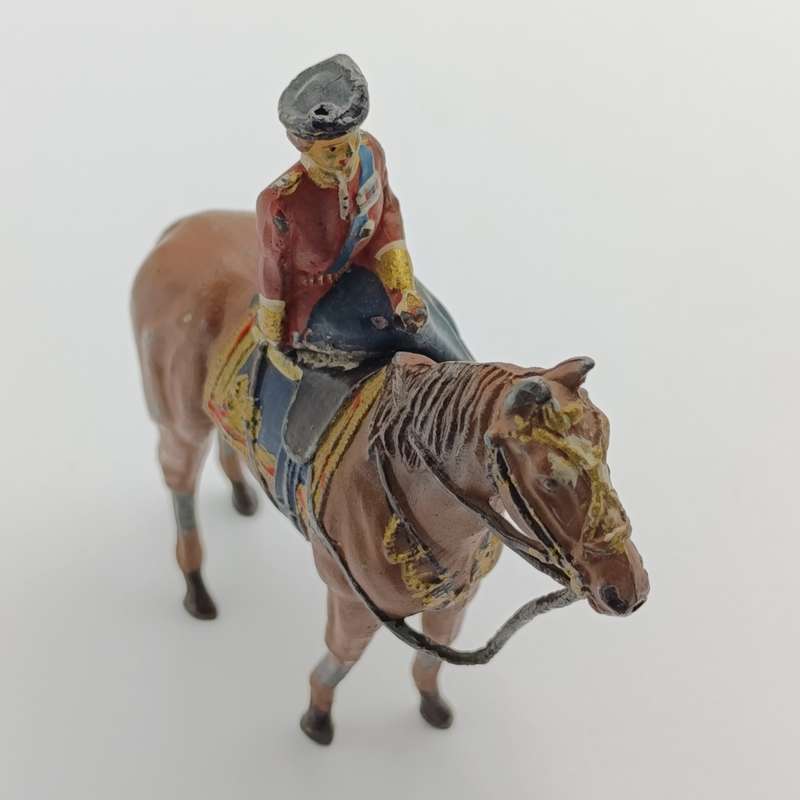 Queen Elizabeth II on horse figurine