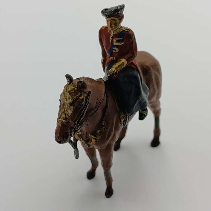 Queen Elizabeth II on horse figurine