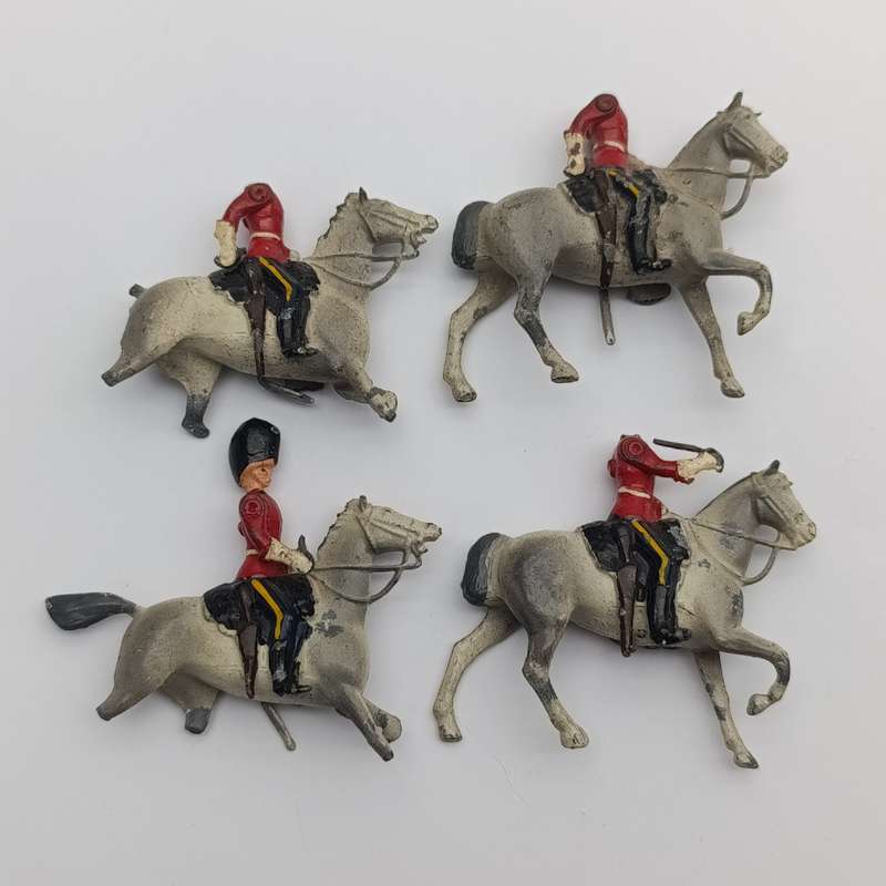 Lot of 4 vintage Britain's Ltd cavalry lead soldiers - damaged