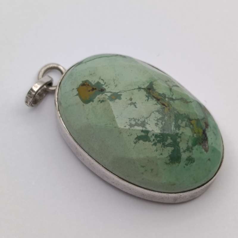 Variscite faceted cabochon 11g with silver surround - stone about 25 carat