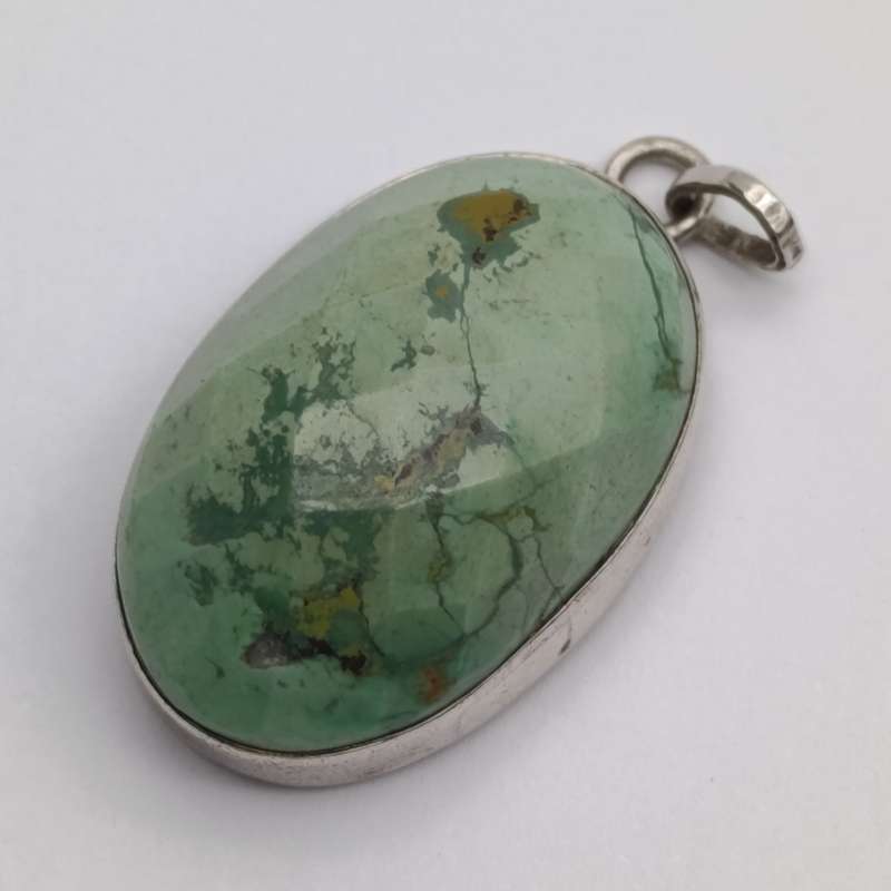 Variscite faceted cabochon 11g with silver surround - stone about 25 carat