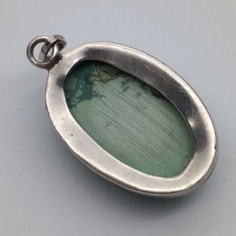 Variscite faceted cabochon 11g with silver surround - stone about 25 carat
