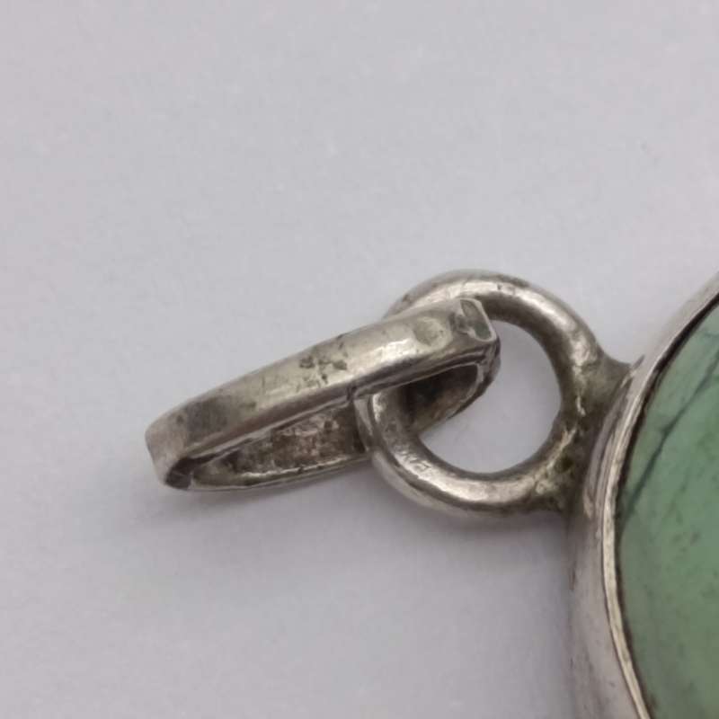 Variscite faceted cabochon 11g with silver surround - stone about 25 carat