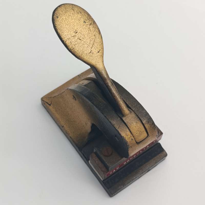 Antique embossing tool for "W.Breytenbach & Co. Tax consultants"