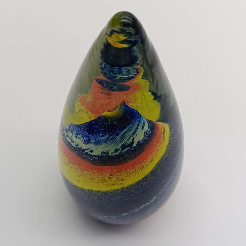 Vintage glass paperweight with colourful spiral