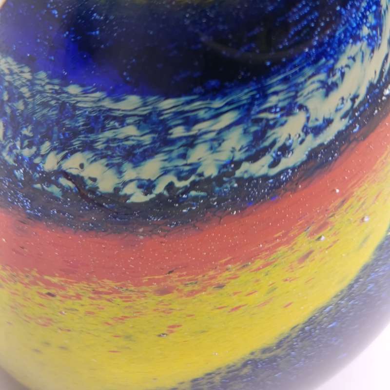 Vintage glass paperweight with colourful spiral
