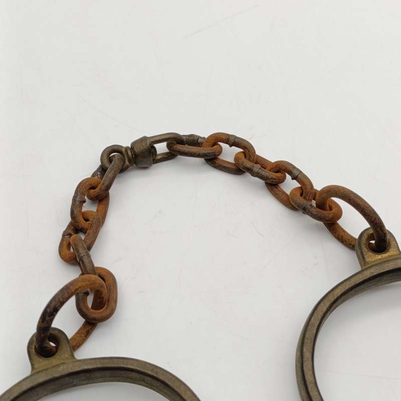 Set of antique brass orbit fetters (cuffs for feet) leg irons