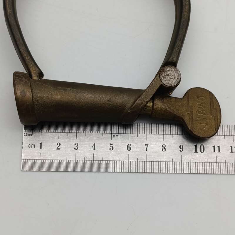 Set of antique brass orbit fetters (cuffs for feet) leg irons