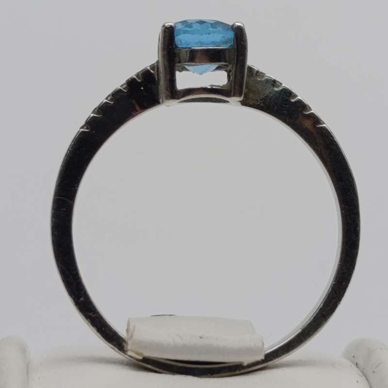 Sterling silver ring with blue Topaz and white sapphires