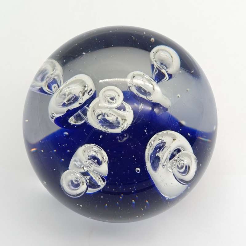 Vintage glass Paperweight with halo and drop designs inside