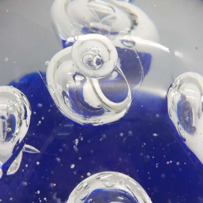 Vintage glass Paperweight with halo and drop designs inside