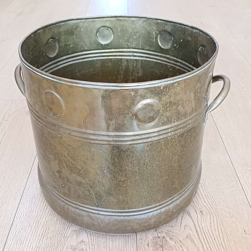Large brass two-handled bucket