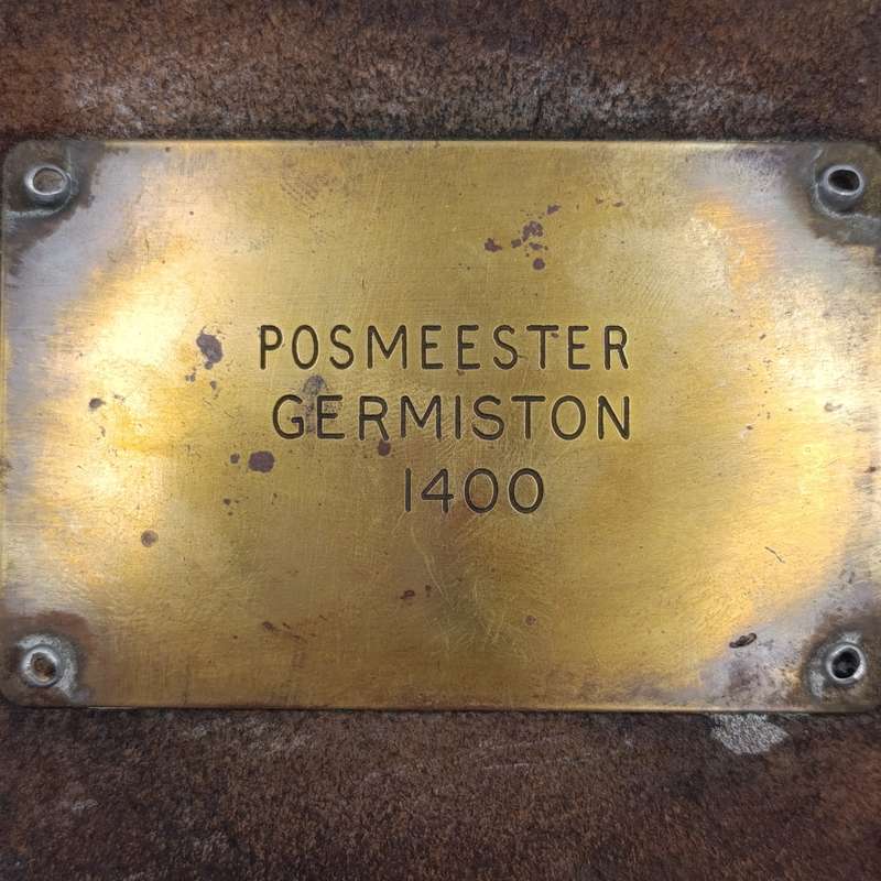 Leather postal tag between Posmeester Germiston and Ontvanger van inkomste