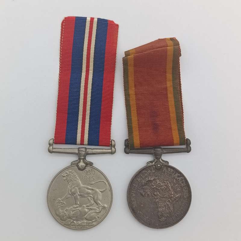 Pair of WW2 medals issued to 214152 C.J. maker