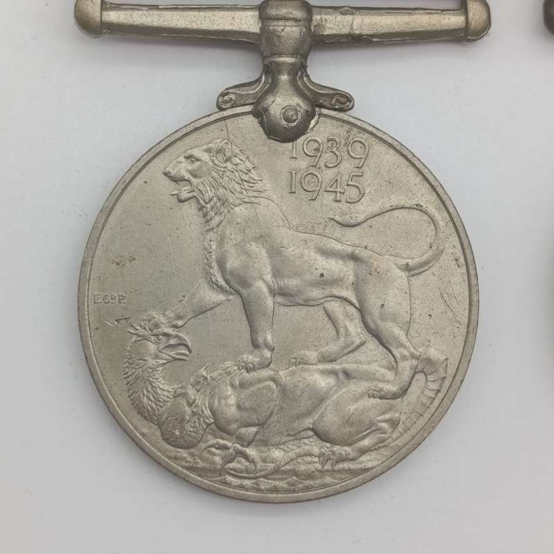 Pair of WW2 medals issued to 214152 C.J. maker