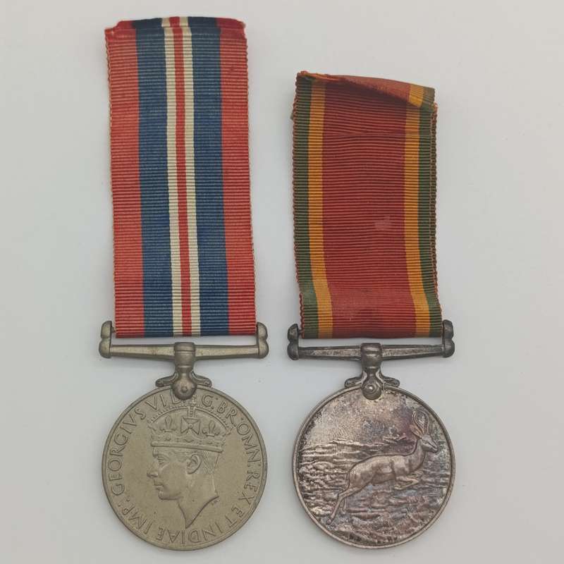 Pair of WW2 medals issued to 214152 C.J. maker