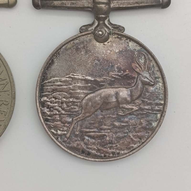 Pair of WW2 medals issued to 214152 C.J. maker