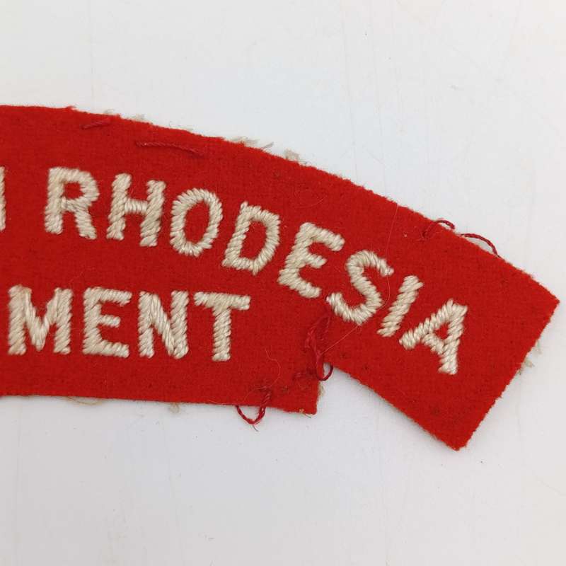 Pair of Northern Rhodesia regiment cloth shoulder titles