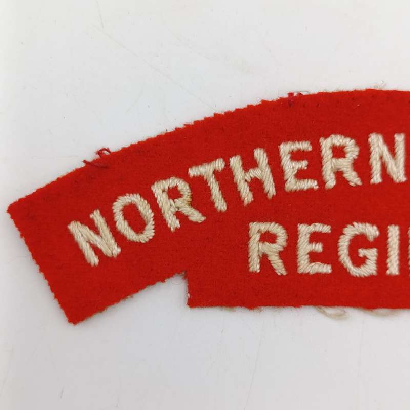 Pair of Northern Rhodesia regiment cloth shoulder titles