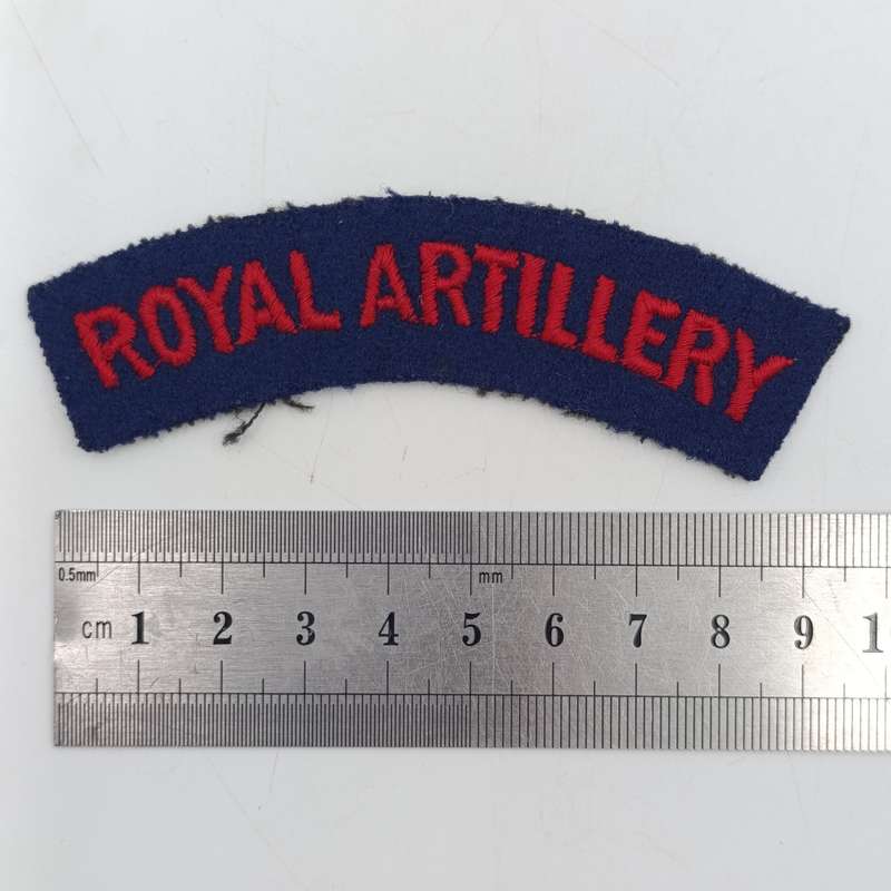 Pair of Royal Artillery cloth shoulder titles