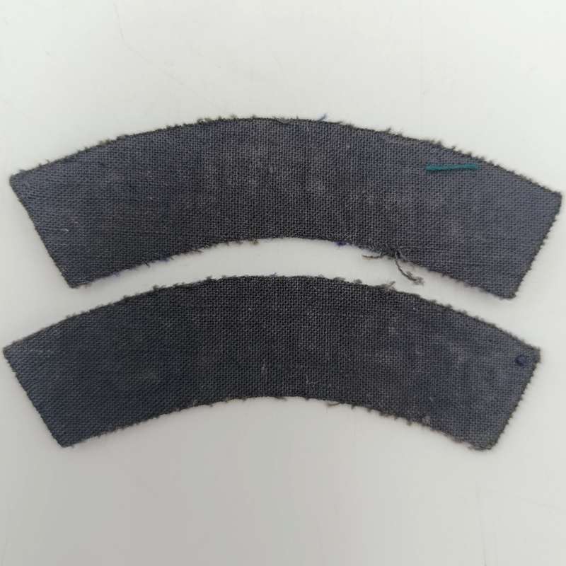 Pair of Royal Artillery cloth shoulder titles