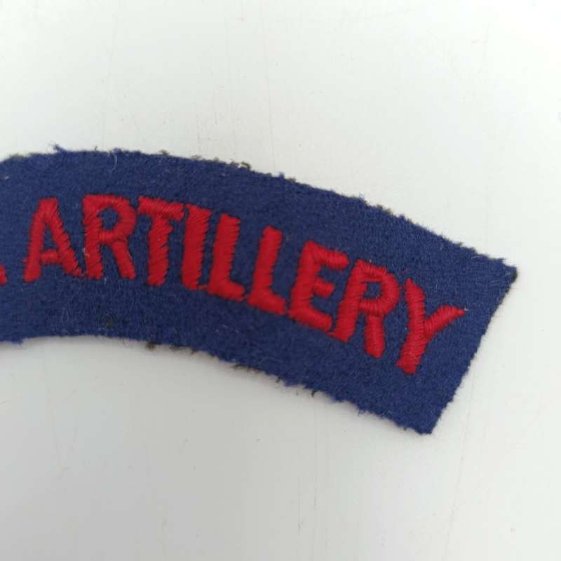 Pair of Royal Artillery cloth shoulder titles