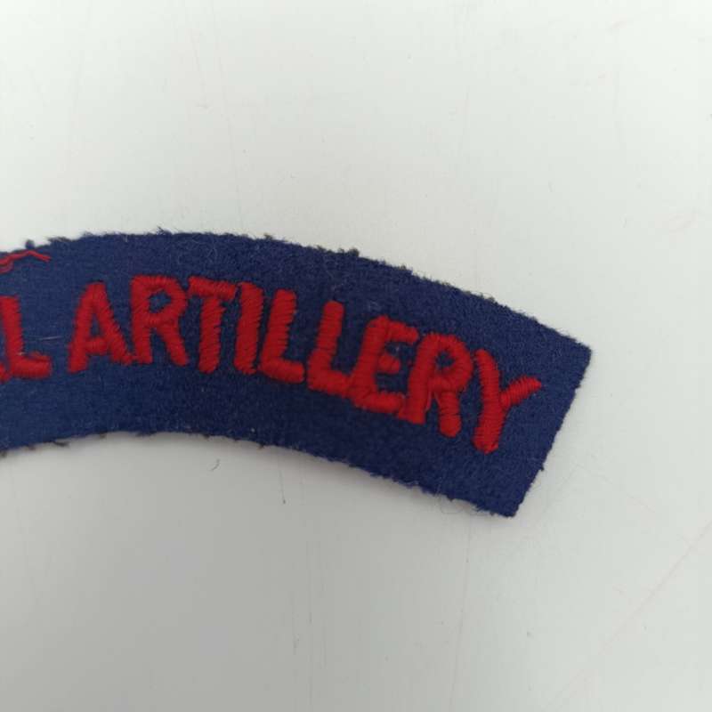 Pair of Royal Artillery cloth shoulder titles