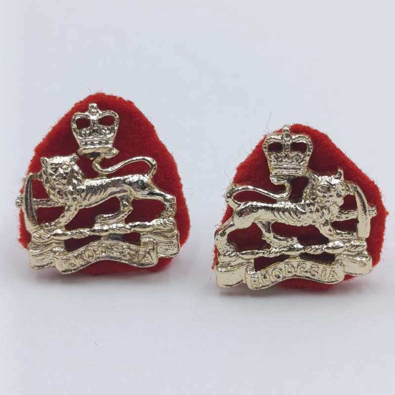 Pair of Rhodesia and Nyasaland mess dress collar badges