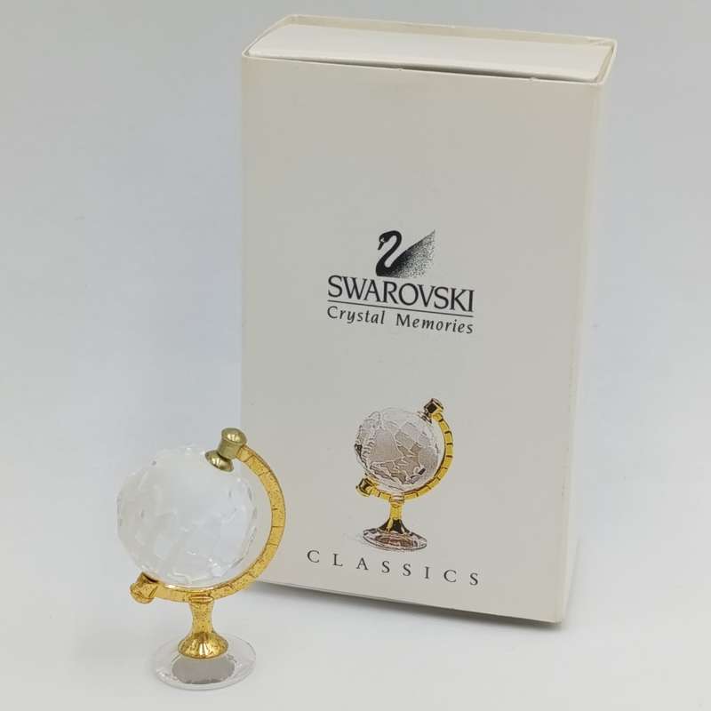 Swarovski crystal memories world globe ornament in box - small chip in South America