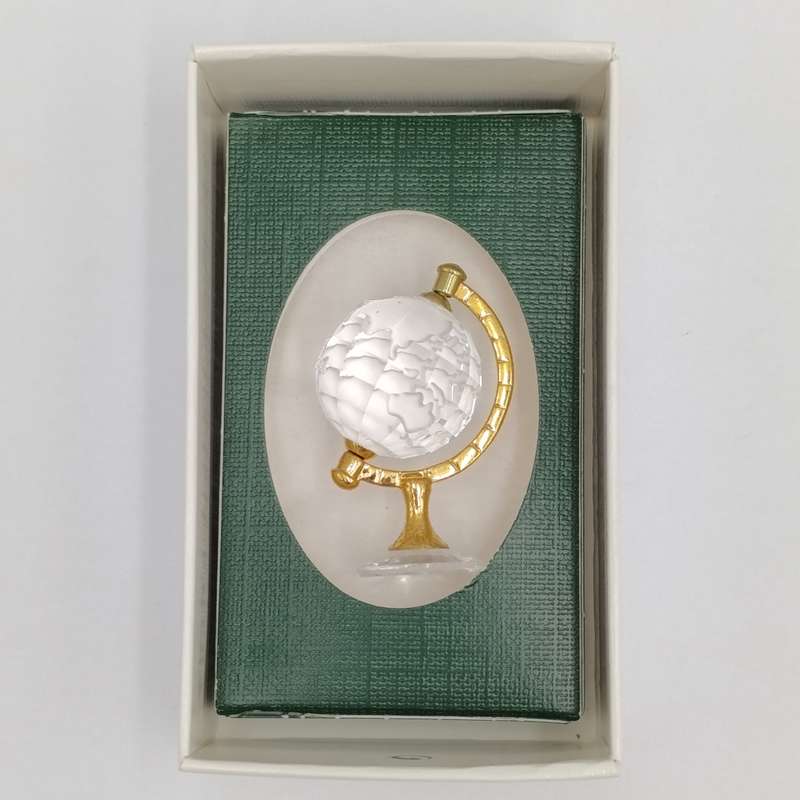 Swarovski crystal memories world globe ornament in box - small chip in South America
