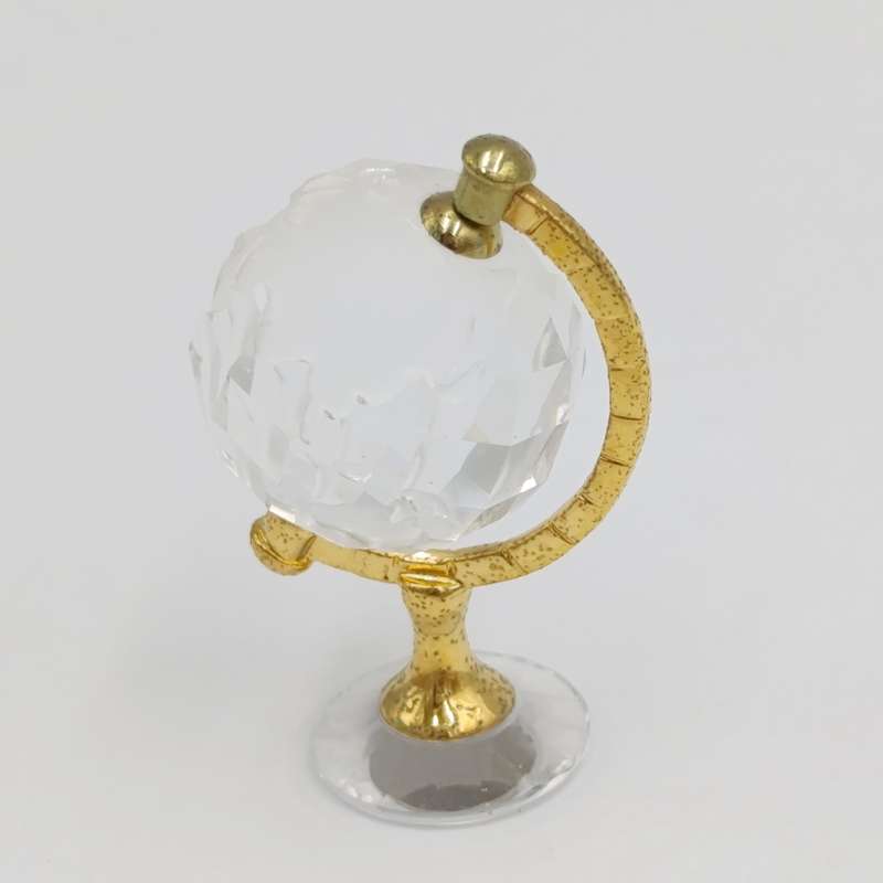 Swarovski crystal memories world globe ornament in box - small chip in South America