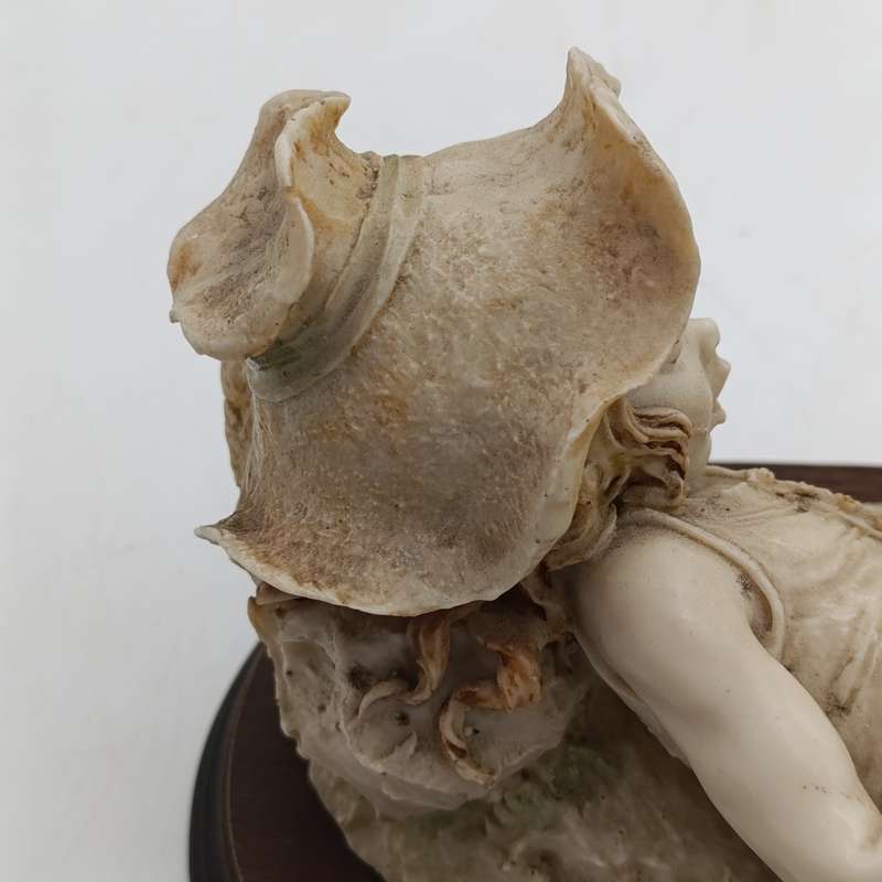 Vintage polyresin sculpture of sleepy girl with cat