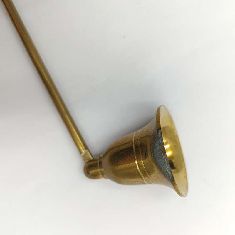 Vintage brass candle snuffer
