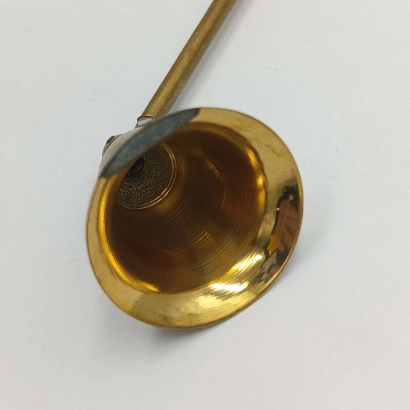 Vintage brass candle snuffer
