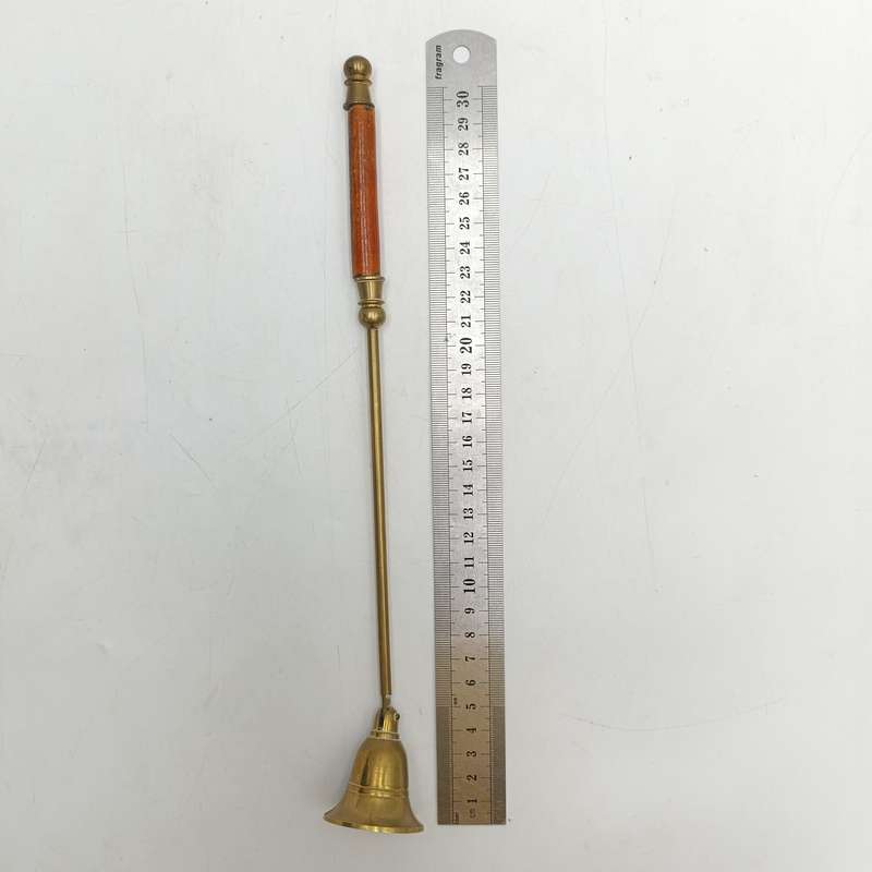 Vintage brass candle snuffer