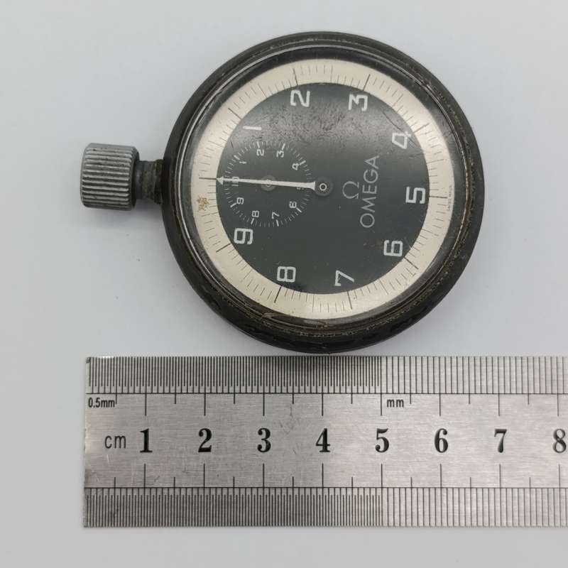 Vintage Omega 10 minute mechanical stopwatch - working press button is sticky