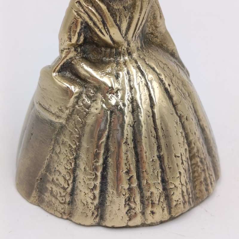 Vintage brass bell - lady with Victorian hoop skirt