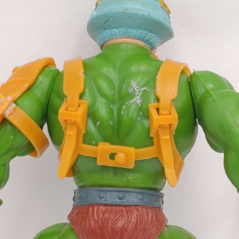 Vintage Masters of the Universe Man-at-Arms figurine with weapons and accessories