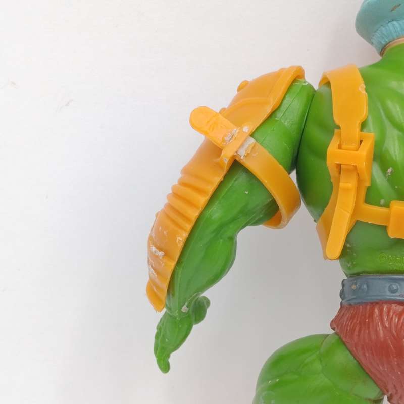Vintage Masters of the Universe Man-at-Arms figurine with weapons and accessories