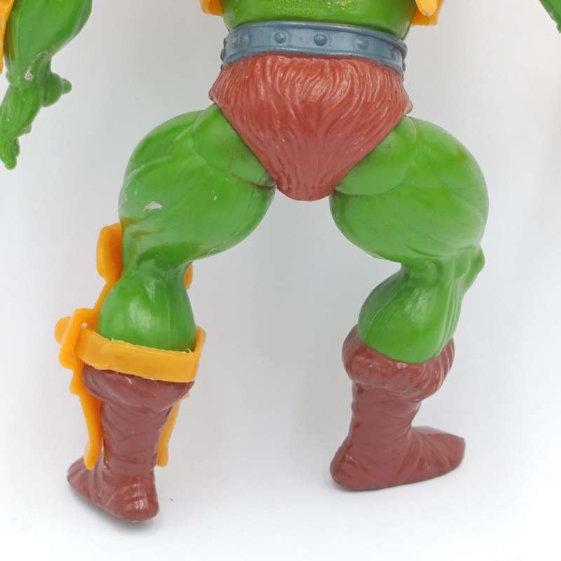 Vintage Masters of the Universe Man-at-Arms figurine with weapons and accessories