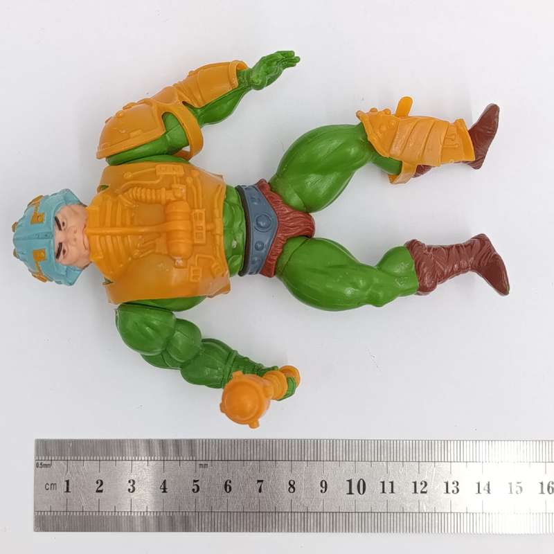 Vintage Masters of the Universe Man-at-Arms figurine with weapons and accessories