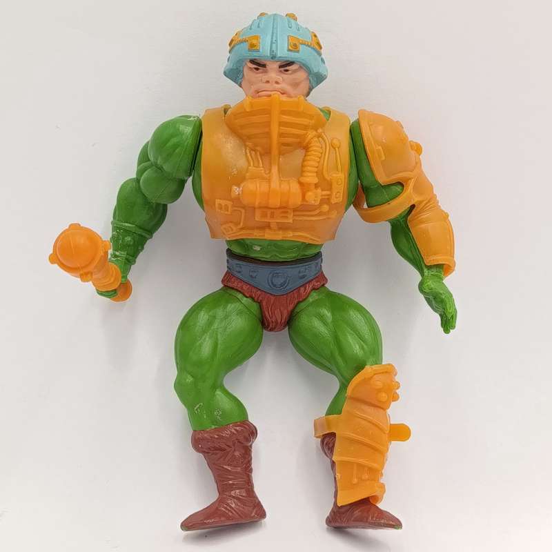 Vintage Masters of the Universe Man-at-Arms figurine with weapons and accessories