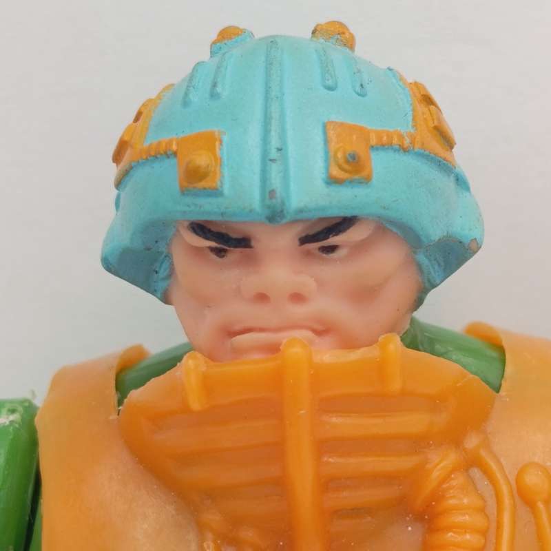 Vintage Masters of the Universe Man-at-Arms figurine with weapons and accessories